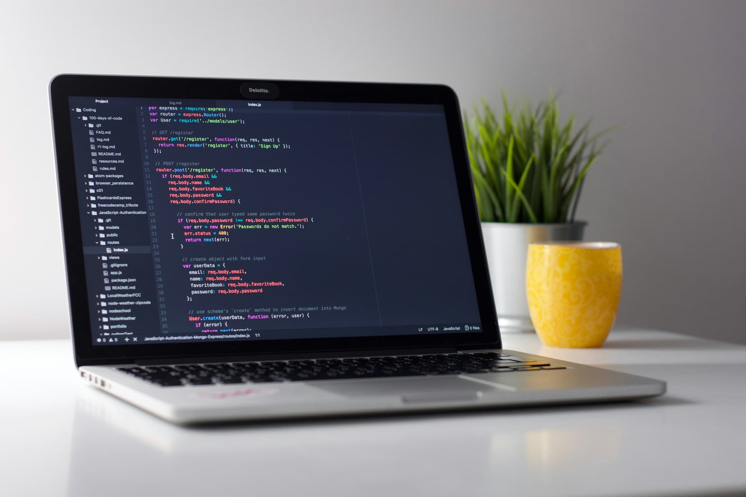 Developer working on native and cross-platform mobile app code Developer working on native and cross-platform mobile app code